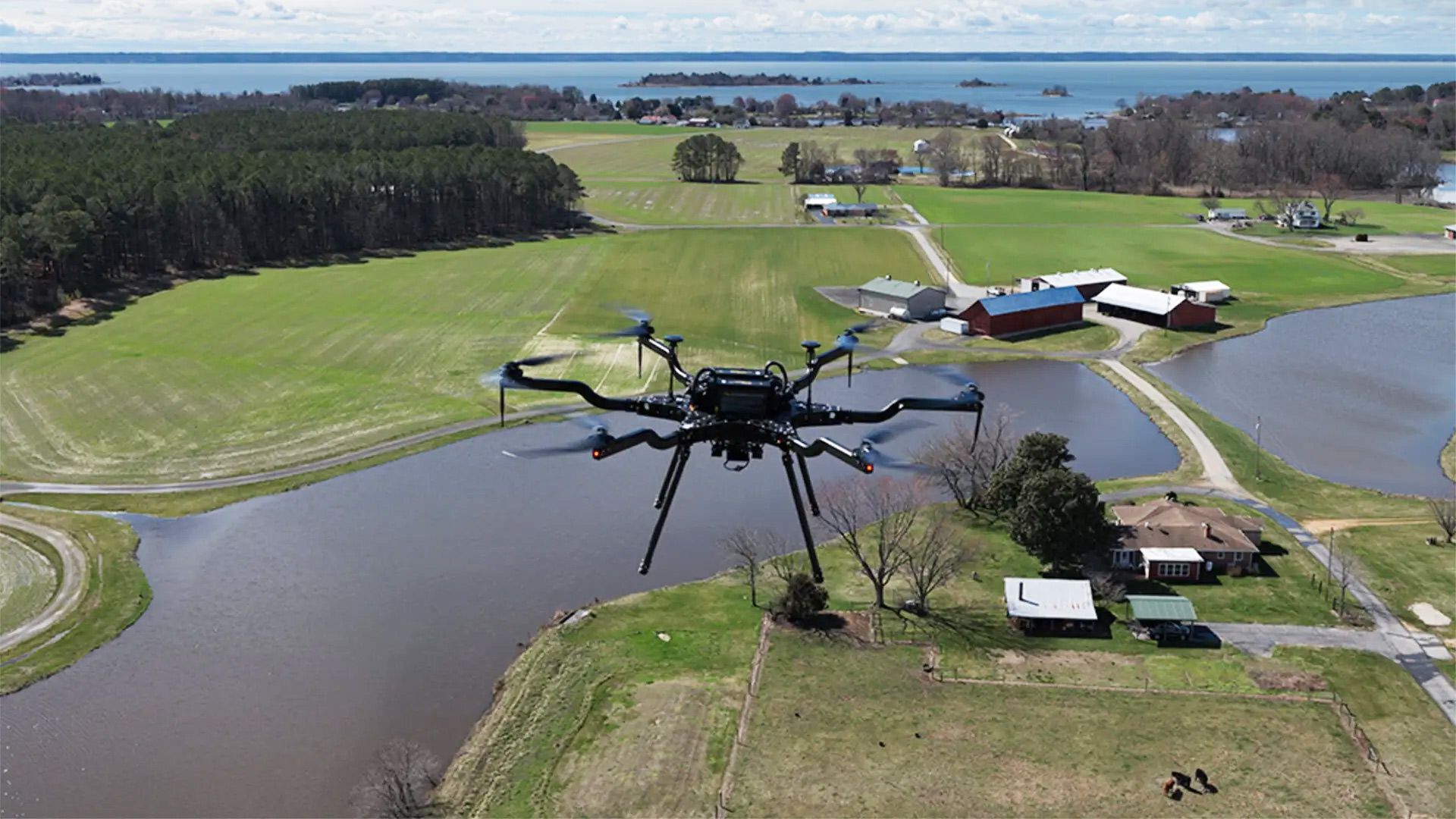 A drone flies over a rural Maryland. In a new initiative, UMD drone experts will work with the state of Maryland to deliver prescriptions to patients on remote Smith Island in the Chesapeake Bay. Photo by Fish and Hunt Maryland.