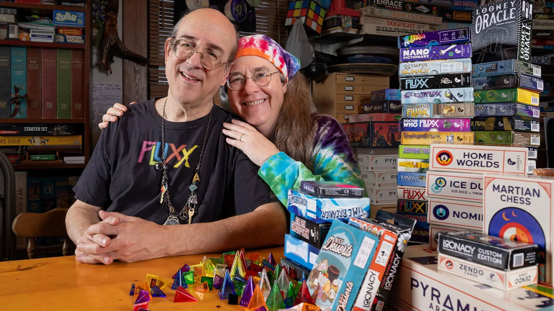 Andy ’86 and Kristin ’88 Looney met as students working at NASA Goddard Space Flight Center; over 34 years of marriage, the pair have developed dozens of games, including the multi-million-selling card game Fluxx, which “represents the zany side of gaming,” said Andy. Photo by Stephanie S. Cordle.