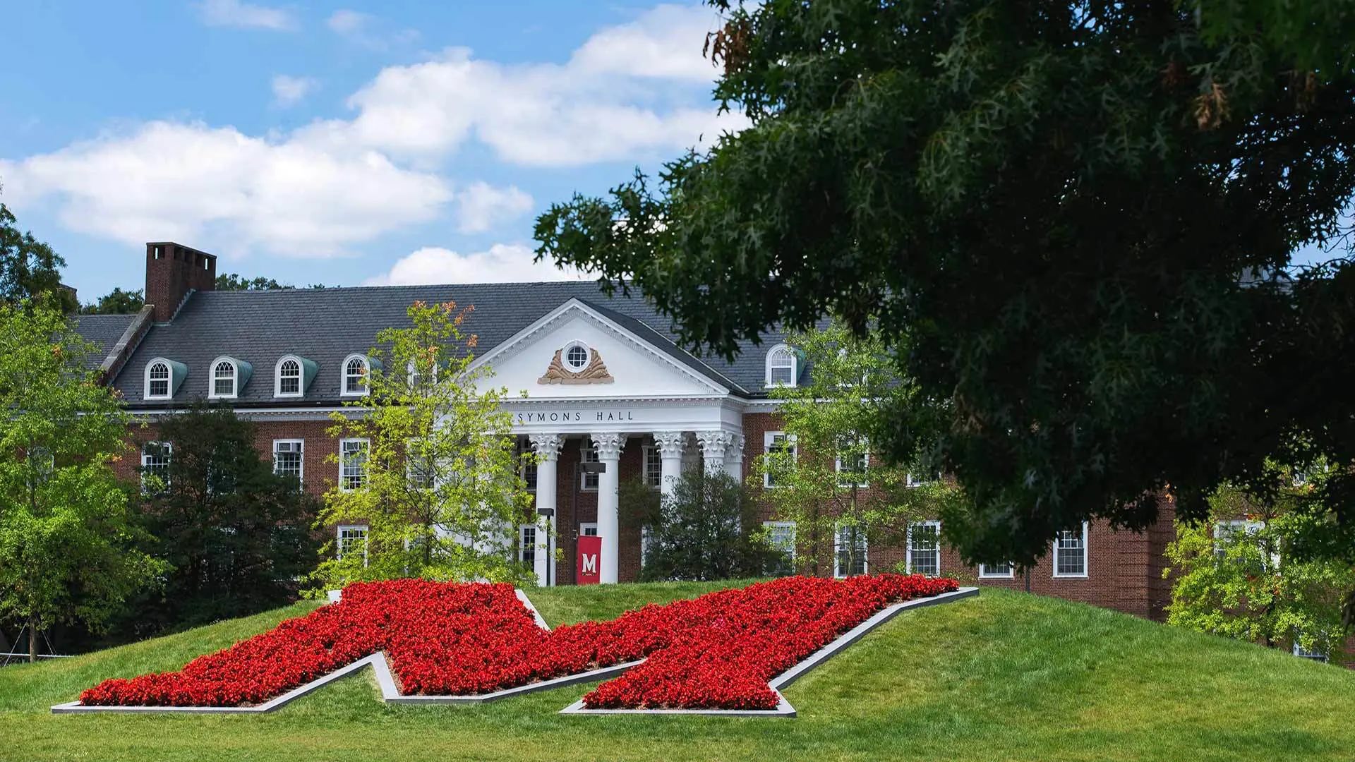 Maryland "M" made via planted flowers in front of Symons Hall on the campus of the University of Maryland, College Park