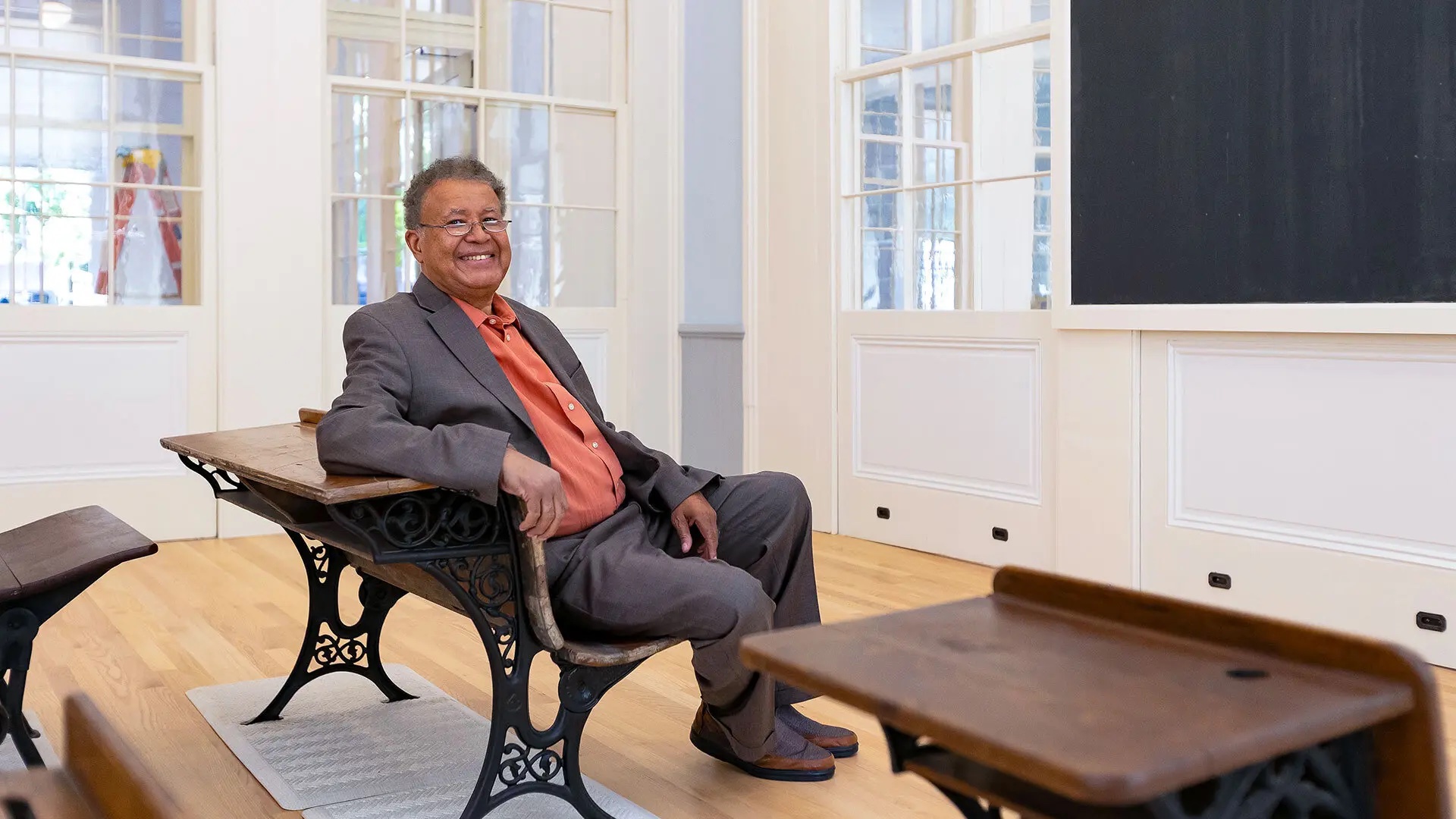 Retired U.S. District Court Judge Alexander Williams, director of the UMD center that bears his name, sits in a restored classroom at the new Thurgood Marshall Amenity Center in West Baltimore. It is housed in historic P.S. 103, where the late U.S. Supreme Court justice attended elementary school. Photo by Riley Sims Ph.D. ’23