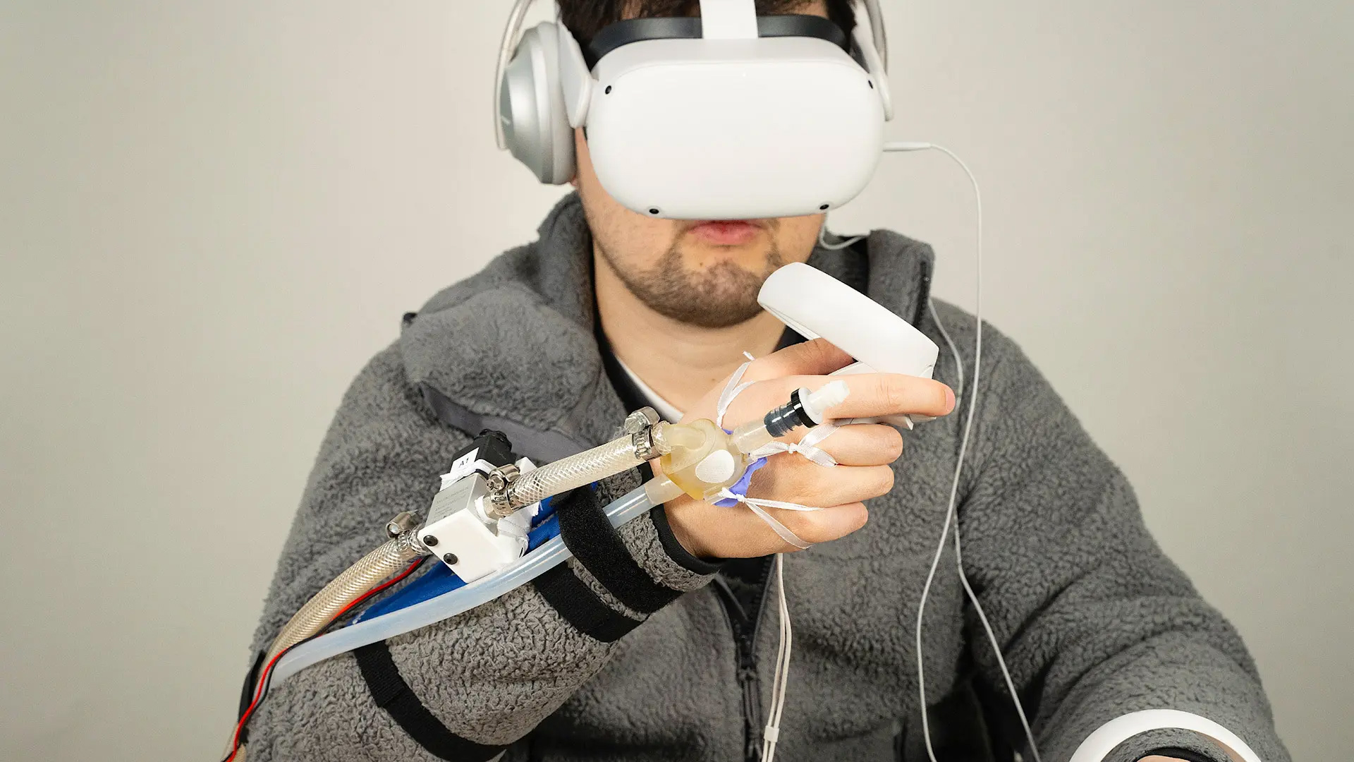 UMD researcher's new haptics system provides force feedback using water pressure rather than via mechanical devices. Photo courtesy of UMD Small Artifacts Lab.